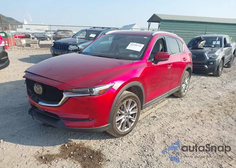 2021 Mazda Cx-5 Grand Touring from USA, damaged, VIN JM3KFADM2M0303871